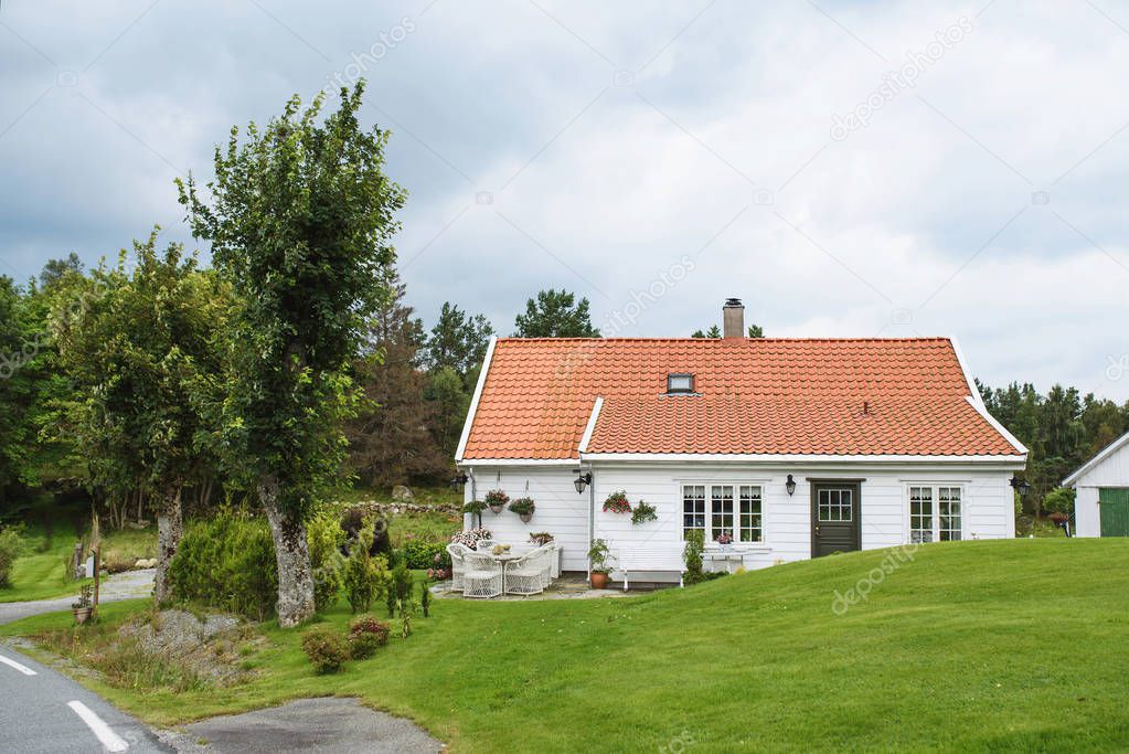 elegant white house with yard and green lawn