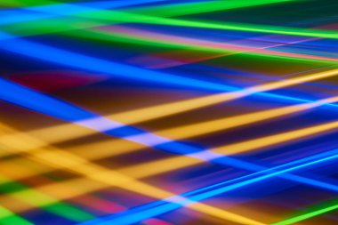 Mavi bokeh arka ışık plan ve doku, bulanık renkli bokeh soyut odaklanmamış arka planda, renkli ışık, uzun pozlama hareket ışıklar