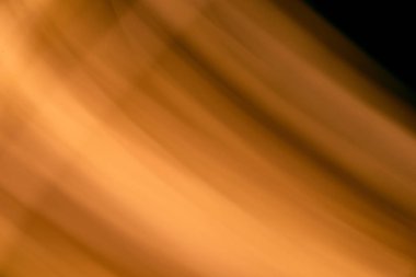 Renkli bokeh soyut odaklanmamış arka plan, altın şerit çizgileri ile uzun pozlama ve hareketli ışık üzerinde bulanık