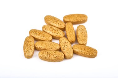 Tıp hapları. Tablet. Capsule.Pharmaceutical ilaç, Close-up yığını mavi, beyaz, sarı ve yeşil tablet - kapsül. Hap ve beyaz arka plan, çeşitli ilaç tıp tablet