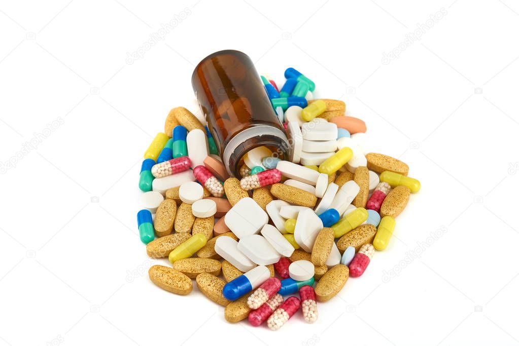 Medicine Pills. Tablets. Capsule.Pharmaceutical medicament, Close-up of pile of blue,white,yellow and green tablets - capsule. Pills and tablets on white background,Assorted pharmaceutical medicine