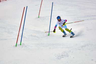 BRASOV, ROMANIA -13 February 2018: Young competitors in Romania Teleferic CUP Junior alpine Ski 2 edition in Poiana Brasov, Romania