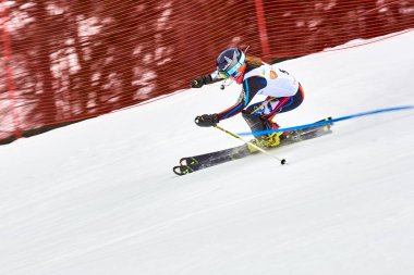 BRASOV, ROMANIA -13 February 2018: Young competitors in Romania Teleferic CUP Junior alpine Ski 2 edition in Poiana Brasov, Romania