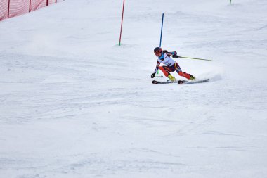 BRASOV, ROMANIA -13 February 2018: Young competitors in Romania Teleferic CUP Junior alpine Ski 2 edition in Poiana Brasov, Romania