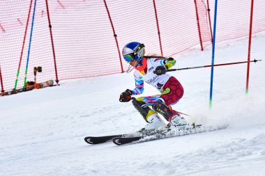 BRASOV, ROMANIA -13 February 2018: Young competitors in Romania Teleferic CUP Junior alpine Ski 2 edition in Poiana Brasov, Romania