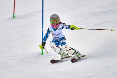 BRASOV, ROMANIA -13 February 2018: Young competitors in Romania Teleferic CUP Junior alpine Ski 2 edition in Poiana Brasov, Romania