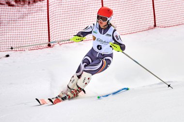 BRASOV, ROMANIA -13 February 2018: Young competitors in Romania Teleferic CUP Junior alpine Ski 2 edition in Poiana Brasov, Romania