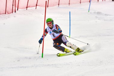 BRASOV, ROMANIA -13 February 2018: Young competitors in Romania Teleferic CUP Junior alpine Ski 2 edition in Poiana Brasov, Romania