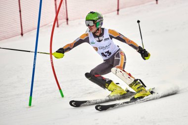 BRASOV, ROMANIA -13 February 2018: Young competitors in Romania Teleferic CUP Junior alpine Ski 2 edition in Poiana Brasov, Romania