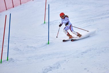 BRASOV, ROMANIA -13 February 2018: Young competitors in Romania Teleferic CUP Junior alpine Ski 2 edition in Poiana Brasov, Romania