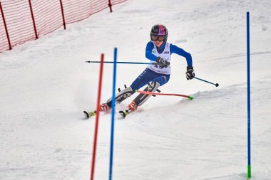 BRASOV, ROMANIA -13 February 2018: Young competitors in Romania Teleferic CUP Junior alpine Ski 2 edition in Poiana Brasov, Romania