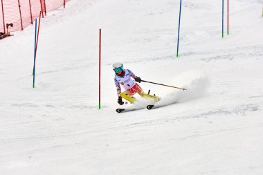 BRASOV, ROMANIA -13 February 2018: Young competitors in Romania Teleferic CUP Junior alpine Ski 2 edition in Poiana Brasov, Romania