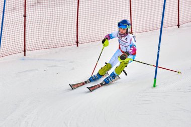 BRASOV, ROMANIA -13 February 2018: Young competitors in Romania Teleferic CUP Junior alpine Ski 2 edition in Poiana Brasov, Romania