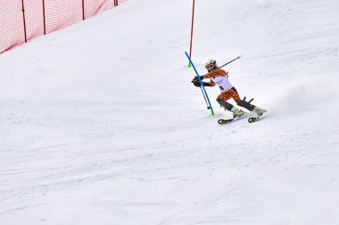 BRASOV, ROMANIA -13 February 2018: Young competitors in Romania Teleferic CUP Junior alpine Ski 2 edition in Poiana Brasov, Romania