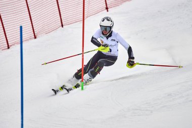 BRASOV, ROMANIA -13 February 2018: Young competitors in Romania Teleferic CUP Junior alpine Ski 2 edition in Poiana Brasov, Romania