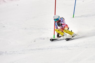 BRASOV, ROMANIA -13 February 2018: Young competitors in Romania Teleferic CUP Junior alpine Ski 2 edition in Poiana Brasov, Romania