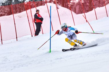 BRASOV, ROMANIA -13 February 2018: Young competitors in Romania Teleferic CUP Junior alpine Ski 2 edition in Poiana Brasov, Romania