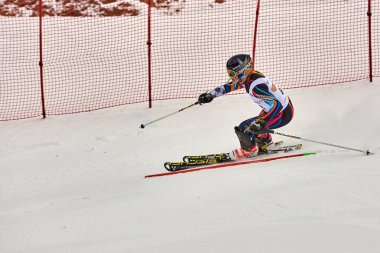 BRASOV, ROMANIA -13 February 2018: Young competitors in Romania Teleferic CUP Junior alpine Ski 2 edition in Poiana Brasov, Romania