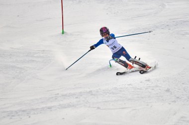 BRASOV, ROMANIA -13 February 2018: Young competitors in Romania Teleferic CUP Junior alpine Ski 2 edition in Poiana Brasov, Romania