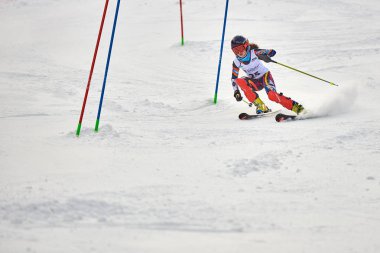 BRASOV, ROMANIA -13 February 2018: Young competitors in Romania Teleferic CUP Junior alpine Ski 2 edition in Poiana Brasov, Romania