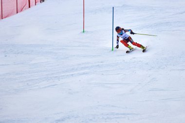 BRASOV, ROMANIA -13 February 2018: Young competitors in Romania Teleferic CUP Junior alpine Ski 2 edition in Poiana Brasov, Romania