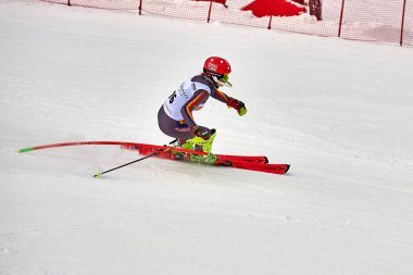 BRASOV, ROMANIA -13 February 2018: Young competitors in Romania Teleferic CUP Junior alpine Ski 2 edition in Poiana Brasov, Romania