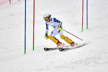 BRASOV, ROMANIA -13 February 2018: Young competitors in Romania Teleferic CUP Junior alpine Ski 2 edition in Poiana Brasov, Romania