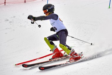 BRASOV, ROMANIA -13 February 2018: Young competitors in Romania Teleferic CUP Junior alpine Ski 2 edition in Poiana Brasov, Romania