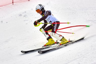 BRASOV, ROMANIA -13 February 2018: Young competitors in Romania Teleferic CUP Junior alpine Ski 2 edition in Poiana Brasov, Romania