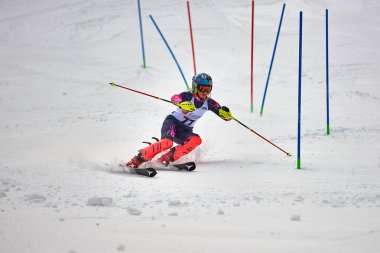 BRASOV, ROMANIA -13 February 2018: Young competitors in Romania Teleferic CUP Junior alpine Ski 2 edition in Poiana Brasov, Romania