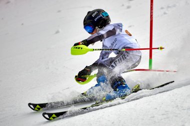 BRASOV, ROMANIA -13 February 2018: Young competitors in Romania Teleferic CUP Junior alpine Ski 2 edition in Poiana Brasov, Romania