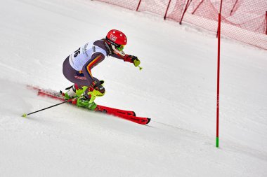 BRASOV, ROMANIA -13 February 2018: Young competitors in Romania Teleferic CUP Junior alpine Ski 2 edition in Poiana Brasov, Romania