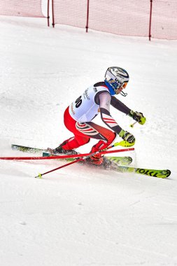 BRASOV, ROMANIA -13 February 2018: Young competitors in Romania Teleferic CUP Junior alpine Ski 2 edition in Poiana Brasov, Romania