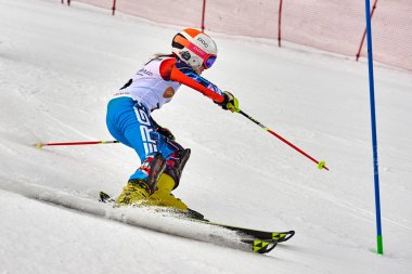 BRASOV, ROMANIA -13 February 2018: Young competitors in Romania Teleferic CUP Junior alpine Ski 2 edition in Poiana Brasov, Romania