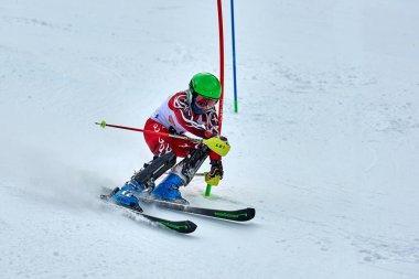 BRASOV, ROMANIA -13 February 2018: Young competitors in Romania Teleferic CUP Junior alpine Ski 2 edition in Poiana Brasov, Romania