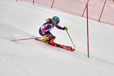 BRASOV, ROMANIA -13 February 2018: Young competitors in Romania Teleferic CUP Junior alpine Ski 2 edition in Poiana Brasov, Romania