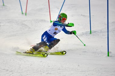 BRASOV, ROMANIA -13 February 2018: Young competitors in Romania Teleferic CUP Junior alpine Ski 2 edition in Poiana Brasov, Romania