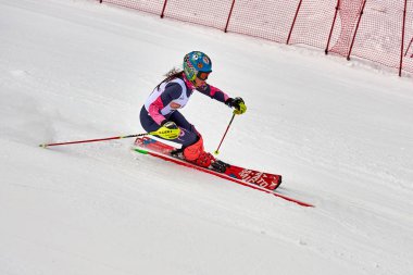 BRASOV, ROMANIA -13 February 2018: Young competitors in Romania Teleferic CUP Junior alpine Ski 2 edition in Poiana Brasov, Romania