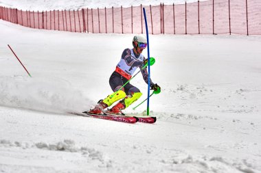 BRASOV, ROMANIA -13 February 2018: Young competitors in Romania Teleferic CUP Junior alpine Ski 2 edition in Poiana Brasov, Romania