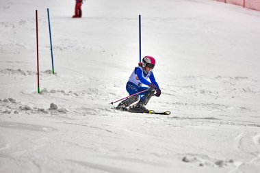 BRASOV, ROMANIA -13 February 2018: Young competitors in Romania Teleferic CUP Junior alpine Ski 2 edition in Poiana Brasov, Romania
