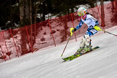 BRASOV, ROMANIA -13 February 2018: Young competitors in Romania Teleferic CUP Junior alpine Ski 2 edition in Poiana Brasov, Romania