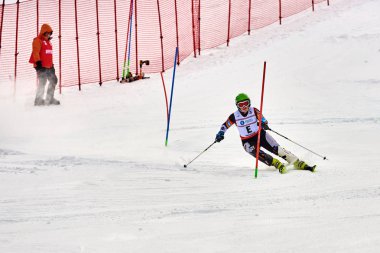 BRASOV, ROMANIA -13 February 2018: Young competitors in Romania Teleferic CUP Junior alpine Ski 2 edition in Poiana Brasov, Romania