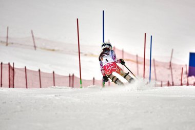 BRASOV, ROMANIA -13 February 2018: Young competitors in Romania Teleferic CUP Junior alpine Ski 2 edition in Poiana Brasov, Romania