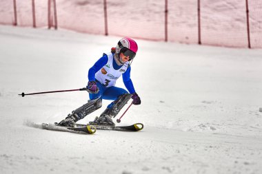 BRASOV, ROMANIA -13 February 2018: Young competitors in Romania Teleferic CUP Junior alpine Ski 2 edition in Poiana Brasov, Romania