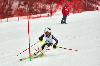 BRASOV, ROMANIA -13 February 2018: Young competitors in Romania Teleferic CUP Junior alpine Ski 2 edition in Poiana Brasov, Romania