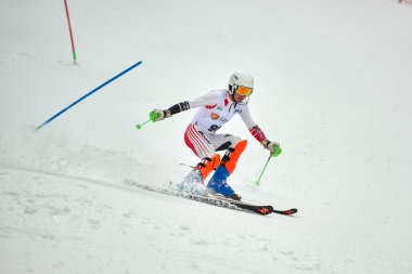 BRASOV, ROMANIA -13 February 2018: Young competitors in Romania Teleferic CUP Junior alpine Ski 2 edition in Poiana Brasov, Romania