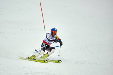 BRASOV, ROMANIA -13 February 2018: Young competitors in Romania Teleferic CUP Junior alpine Ski 2 edition in Poiana Brasov, Romania