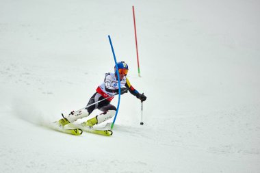 BRASOV, ROMANIA -13 February 2018: Young competitors in Romania Teleferic CUP Junior alpine Ski 2 edition in Poiana Brasov, Romania