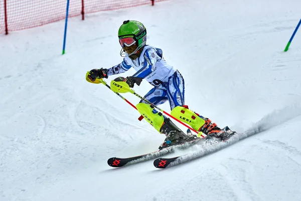 BRASOV, ROMANIA -13 February 2018: Young competitors in Romania Teleferic CUP Junior alpine Ski 2 edition in Poiana Brasov, Romania
