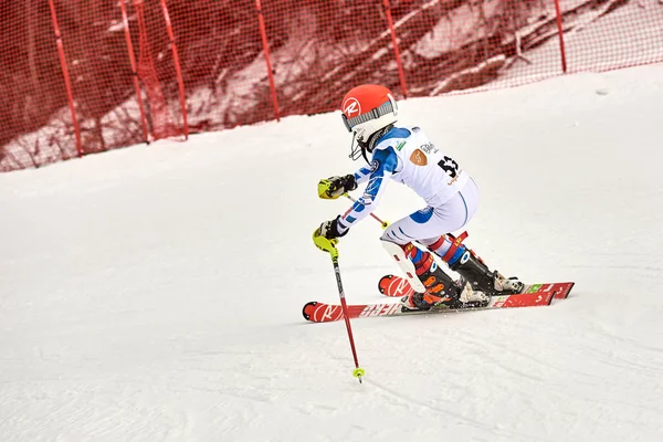 BRASOV, ROMANIA -13 February 2018: Young competitors in Romania Teleferic CUP Junior alpine Ski 2 edition in Poiana Brasov, Romania
